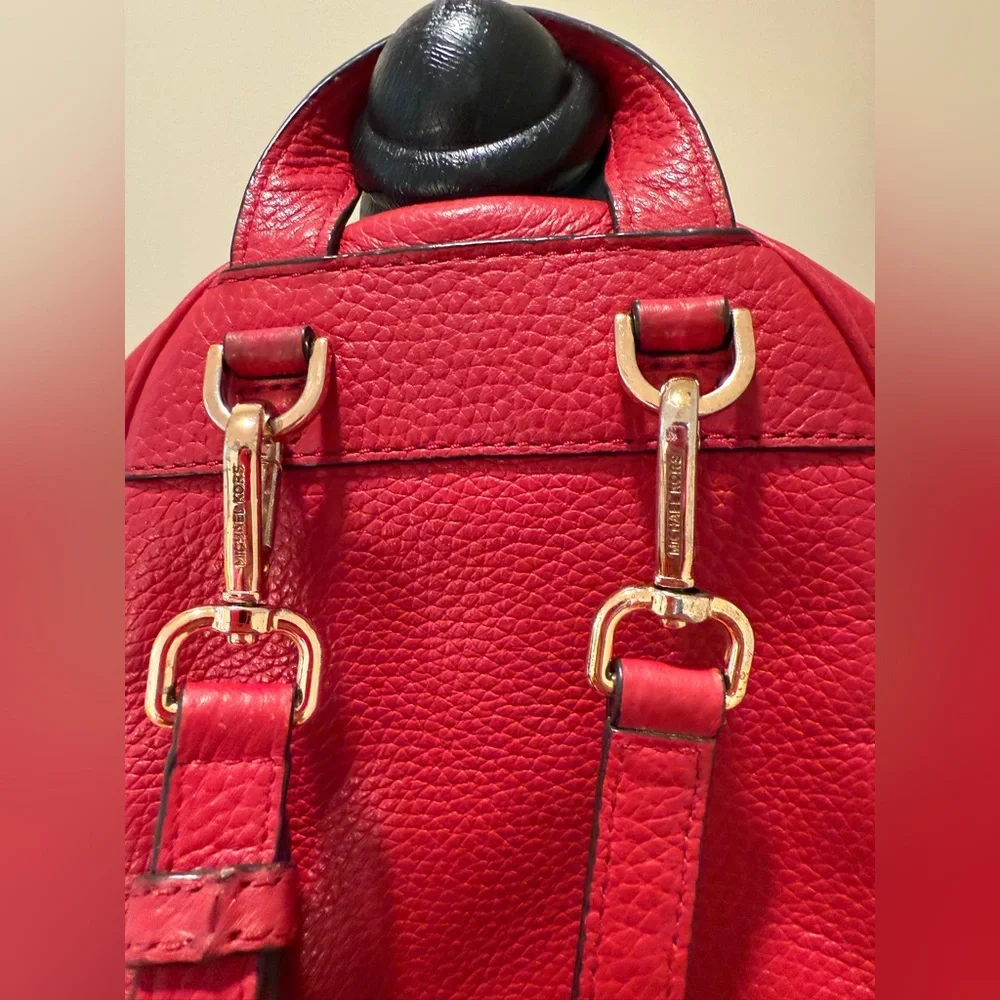Michael Kors Abbey XS Studded Red Backpack with Gold Studs
Size 7 by 8 by 3 - Picture 6 of 16